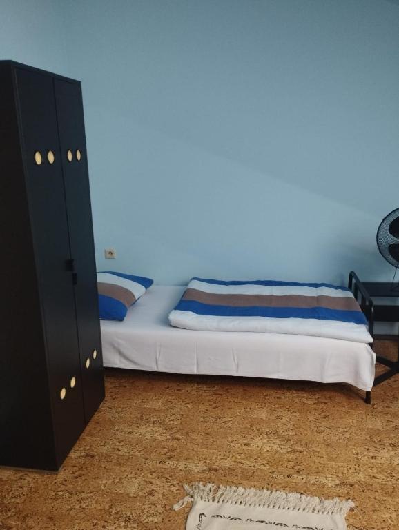 Voodi või voodid majutusasutuse Koloťuk toas