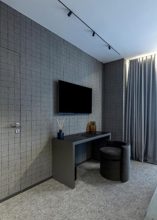TV a/nebo společenská místnost v ubytování Zeta Rentals