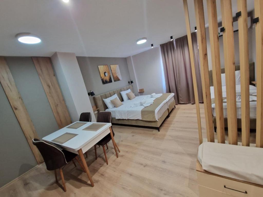 Postel nebo postele na pokoji v ubytování Hotel CENTRAL