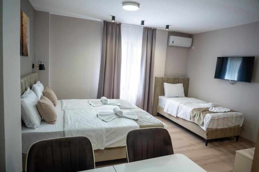 Postel nebo postele na pokoji v ubytování Hotel CENTRAL