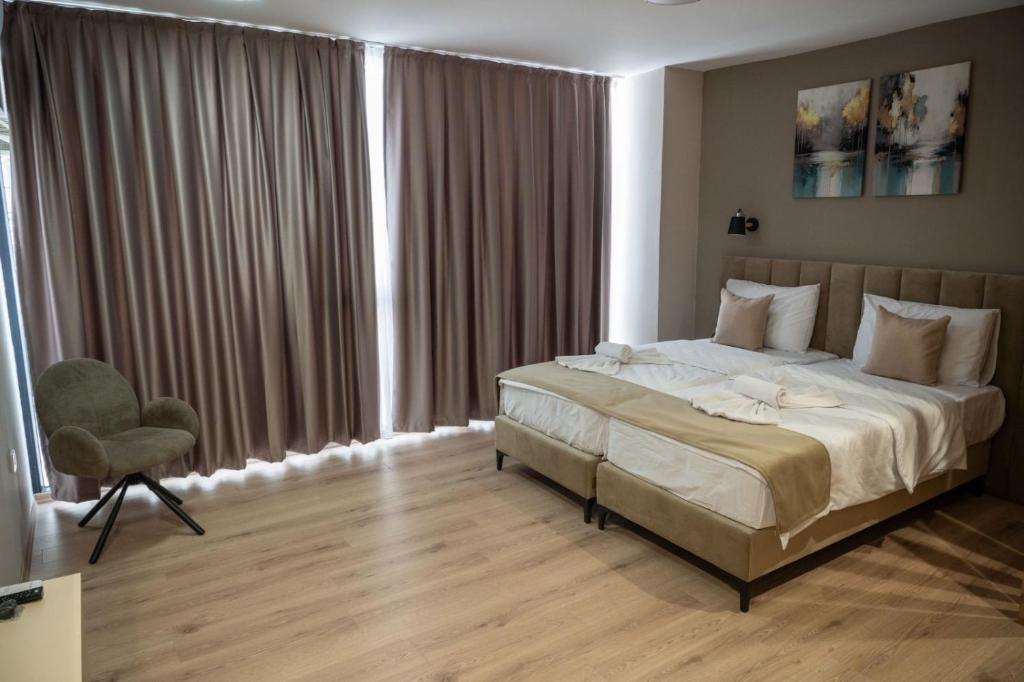Postel nebo postele na pokoji v ubytování Hotel CENTRAL
