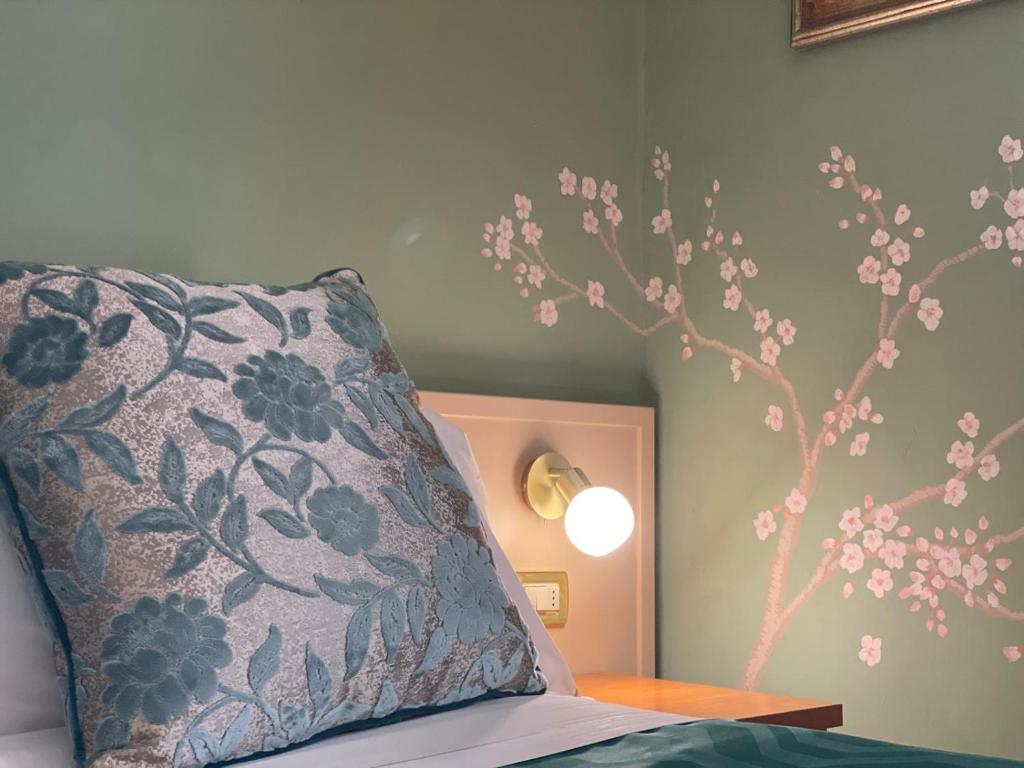 Postel nebo postele na pokoji v ubytování Hotel Maxim Axial