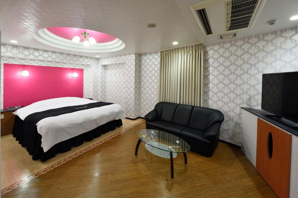 TV a/nebo společenská místnost v ubytování Hotel S