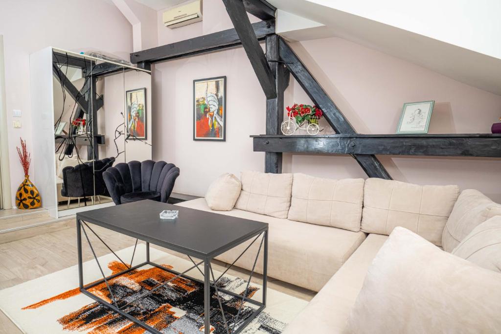 Ruang duduk di He-Ra Apartments with Free Parking