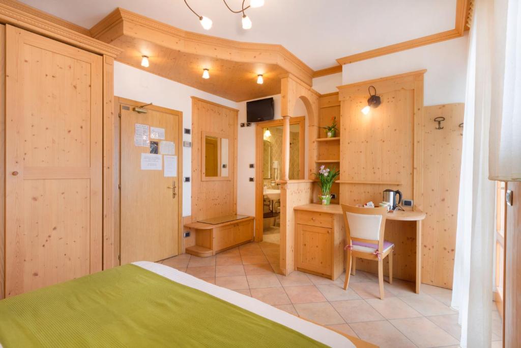 Postel nebo postele na pokoji v ubytování Hotel Angelo