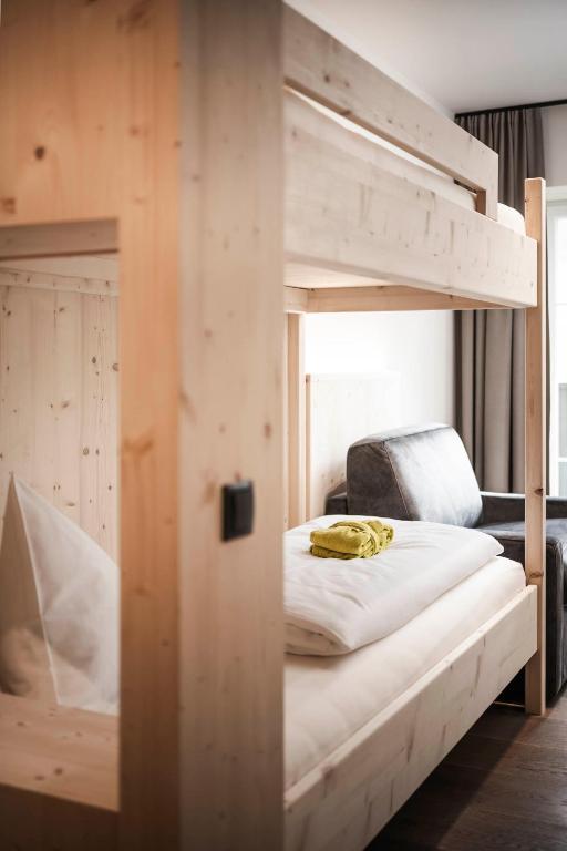 Łóżko lub łóżka w pokoju w obiekcie Vital Hotel Ortlerspitz