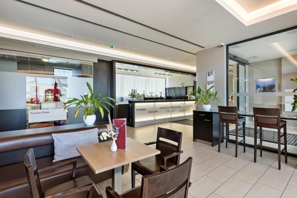 Kuchyň nebo kuchyňský kout v ubytování Austria Trend Hotel Salzburg Messe