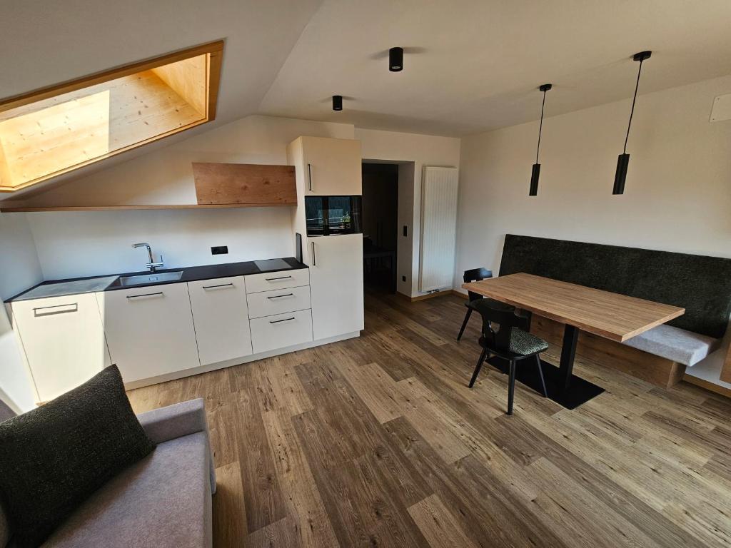 Kuchyň nebo kuchyňský kout v ubytování Apartments Kranebitt