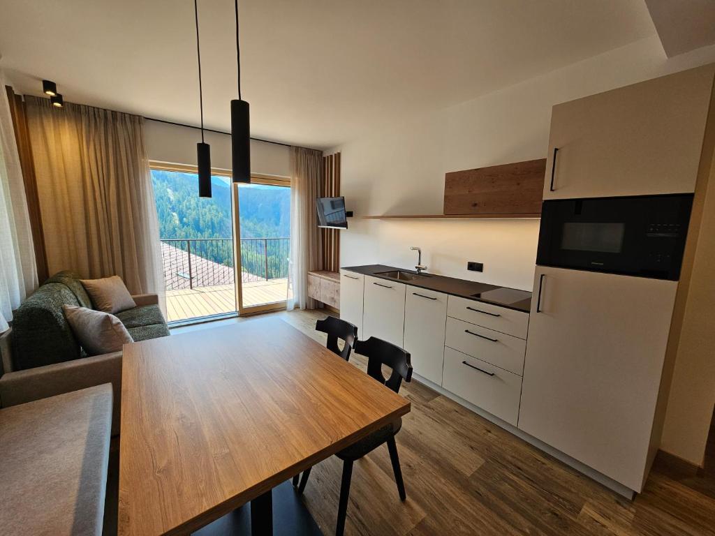Kuchyň nebo kuchyňský kout v ubytování Apartments Kranebitt