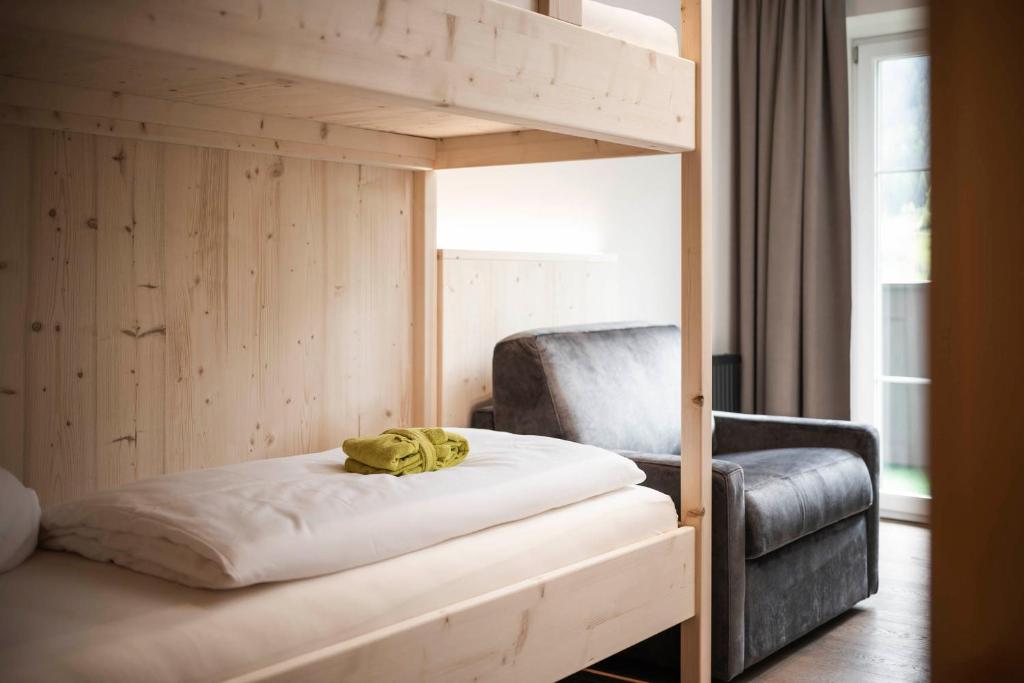 Łóżko lub łóżka w pokoju w obiekcie Vital Hotel Ortlerspitz