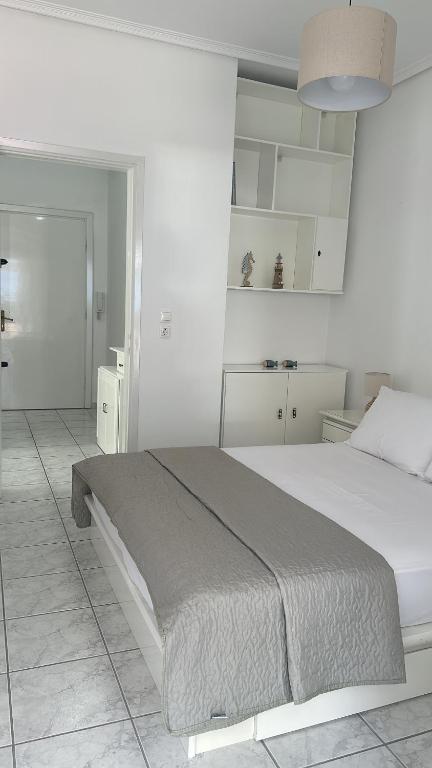 Postel nebo postele na pokoji v ubytování Alice Apartment