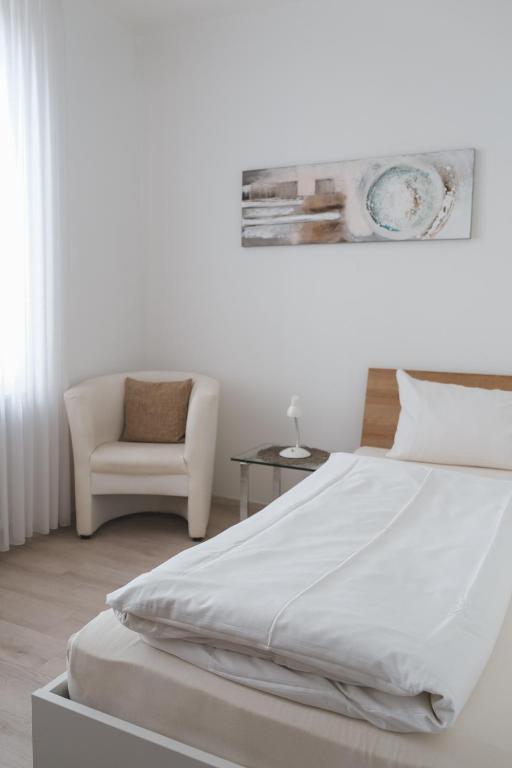 Postel nebo postele na pokoji v ubytování Hotel Restaurant Alt Pirmasens