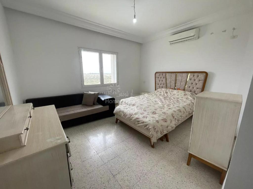 Postel nebo postele na pokoji v ubytování location saisonnière S3 à Hergla
