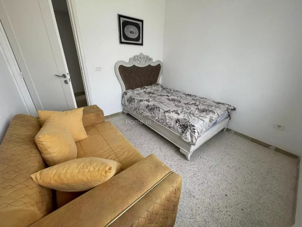 Postel nebo postele na pokoji v ubytování location saisonnière S3 à Hergla