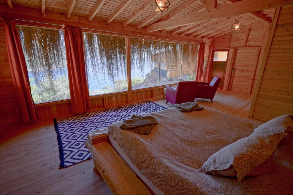 Postel nebo postele na pokoji v ubytování Flavia Hotel