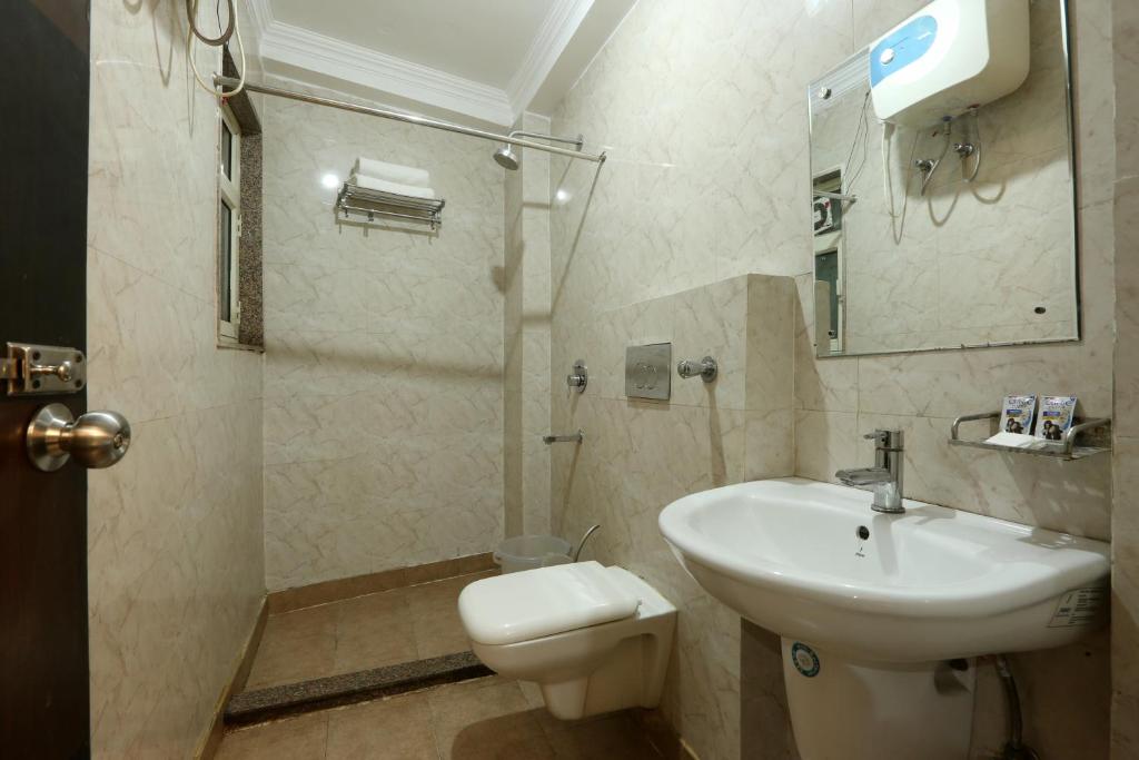 Koupelna v ubytování Hotel Ark Suites At Airport