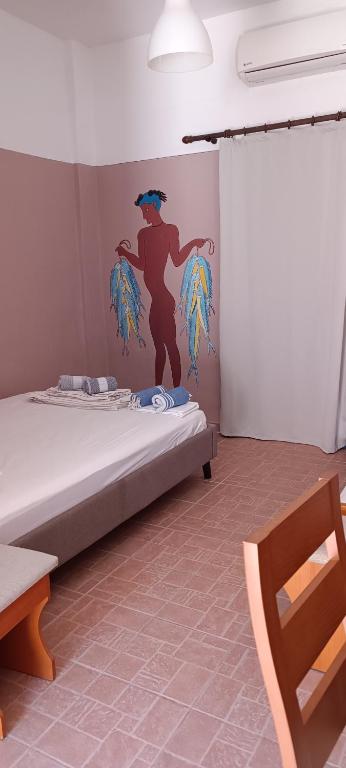 Postel nebo postele na pokoji v ubytování Keramos