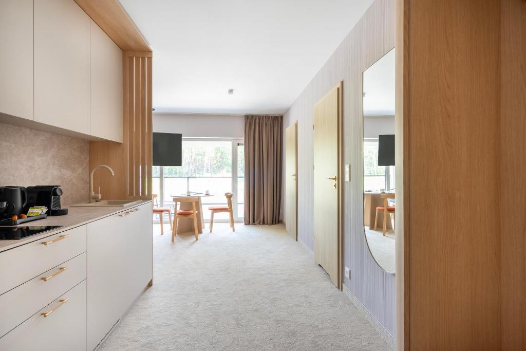 Kuchyň nebo kuchyňský kout v ubytování Sea Shell Apartments Łukęcin