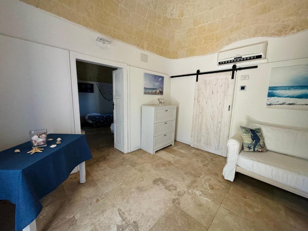 Postel nebo postele na pokoji v ubytování Baia Sangiorgio Hotel & Beach Club