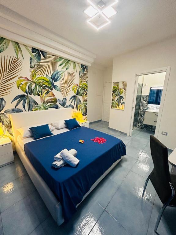 Postel nebo postele na pokoji v ubytování Ca Dó Sorrento Sensations