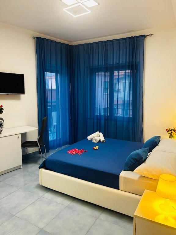 Postel nebo postele na pokoji v ubytování Ca Dó Sorrento Sensations