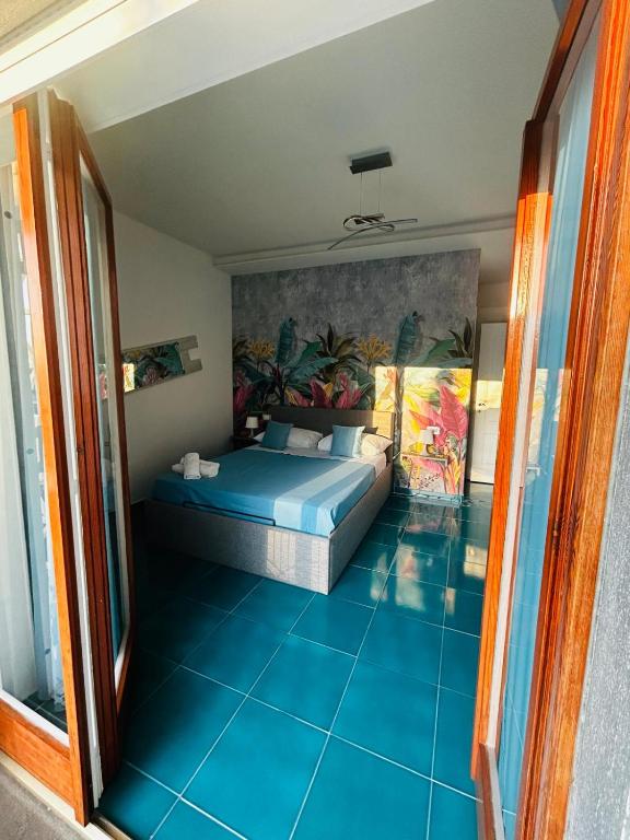 Postel nebo postele na pokoji v ubytování Ca Dó Sorrento Sensations