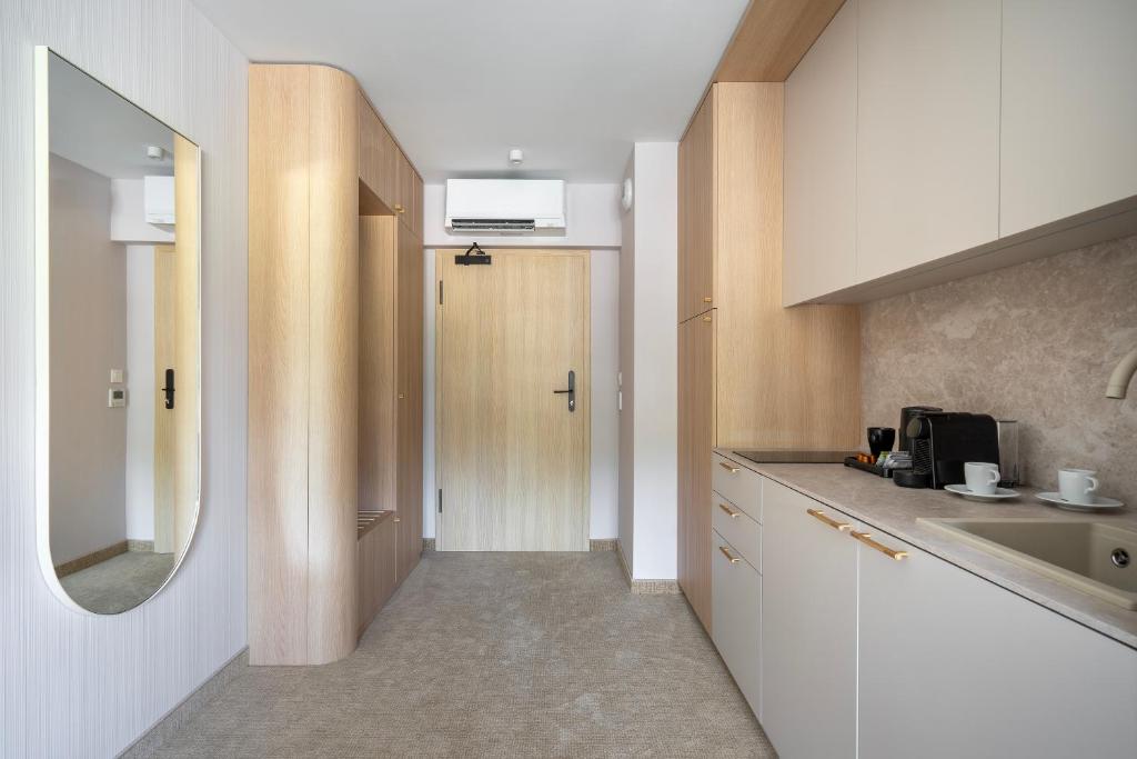 Kuchyň nebo kuchyňský kout v ubytování Sea Shell Apartments Łukęcin