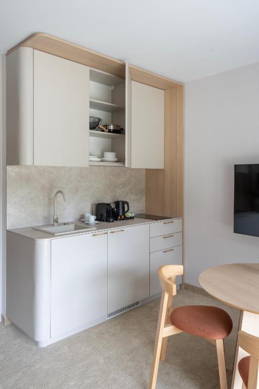 Kuchyň nebo kuchyňský kout v ubytování Sea Shell Apartments Łukęcin