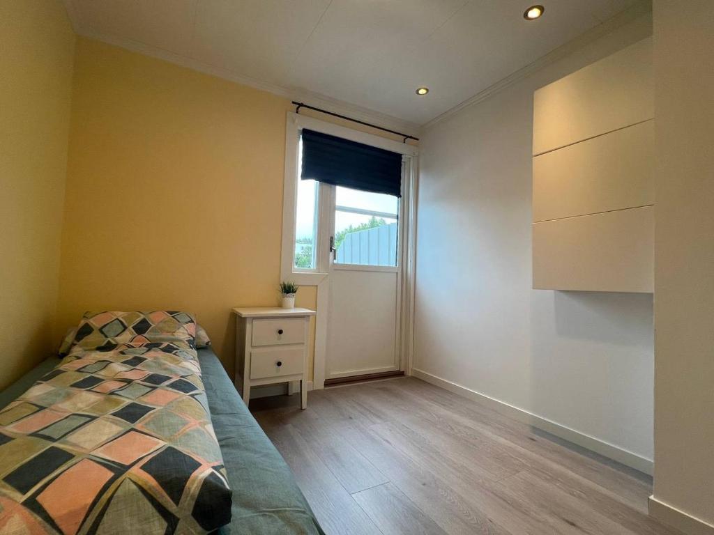 Ένα ή περισσότερα κρεβάτια σε δωμάτιο στο Cozy Urban Single Room