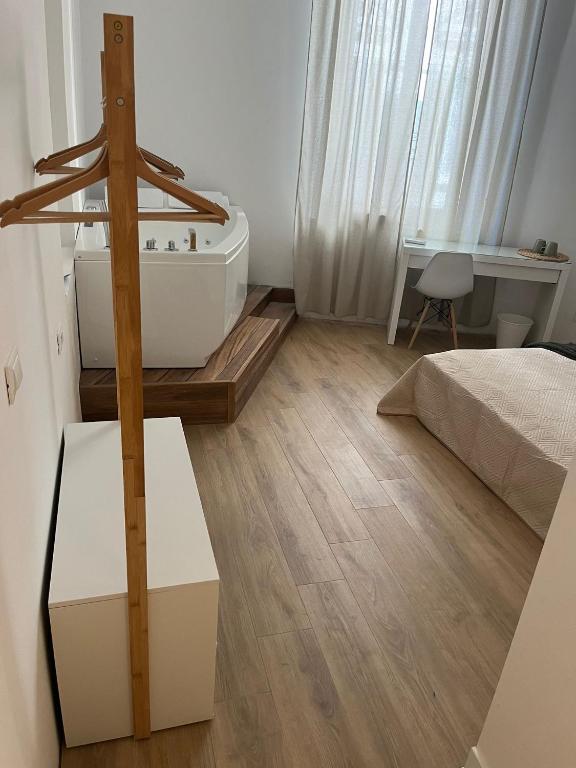 Postel nebo postele na pokoji v ubytování 20 Settembre Rooms