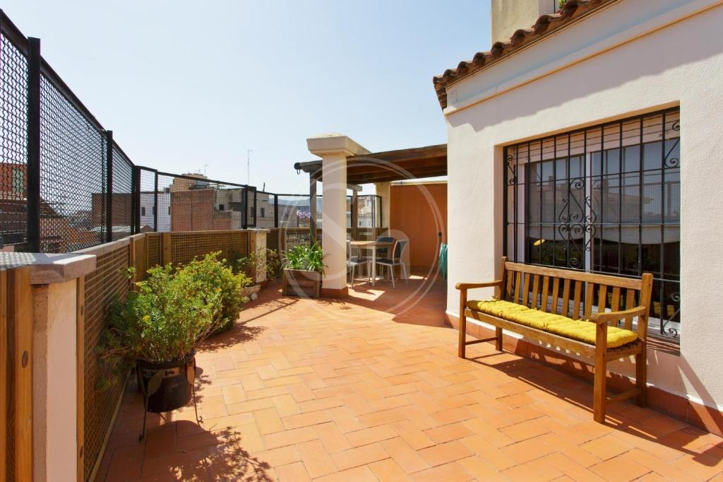 Barcelona Eixample Apartment with Private Terrace
