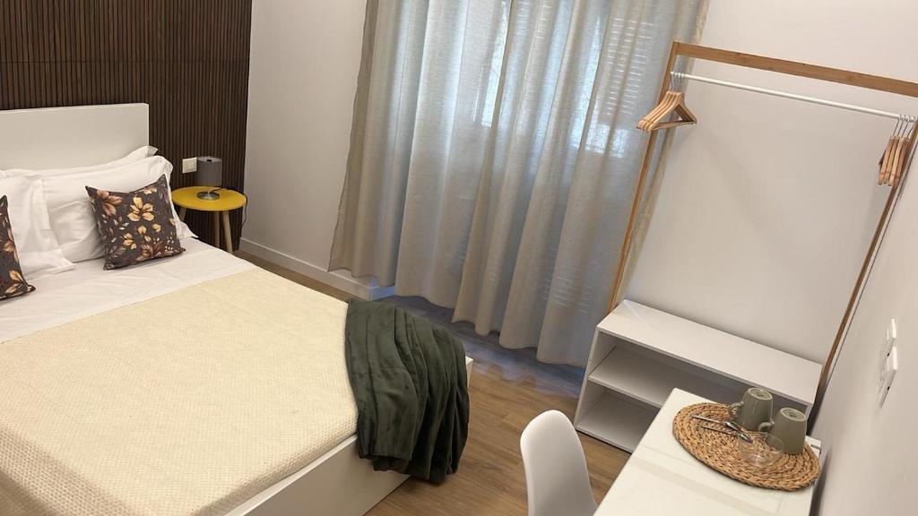 Postel nebo postele na pokoji v ubytování 20 Settembre Rooms