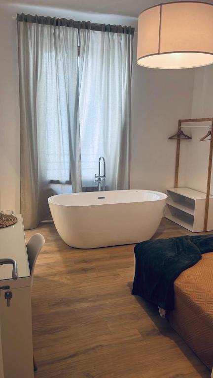 Postel nebo postele na pokoji v ubytování 20 Settembre Rooms