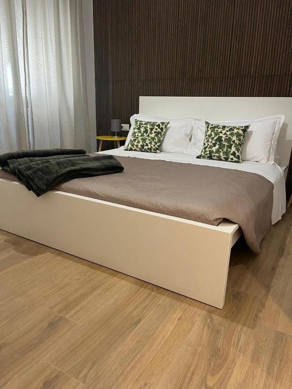 Postel nebo postele na pokoji v ubytování 20 Settembre Rooms