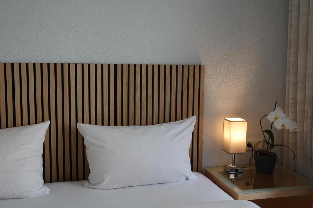 Postel nebo postele na pokoji v ubytování Hotel Birnbaum