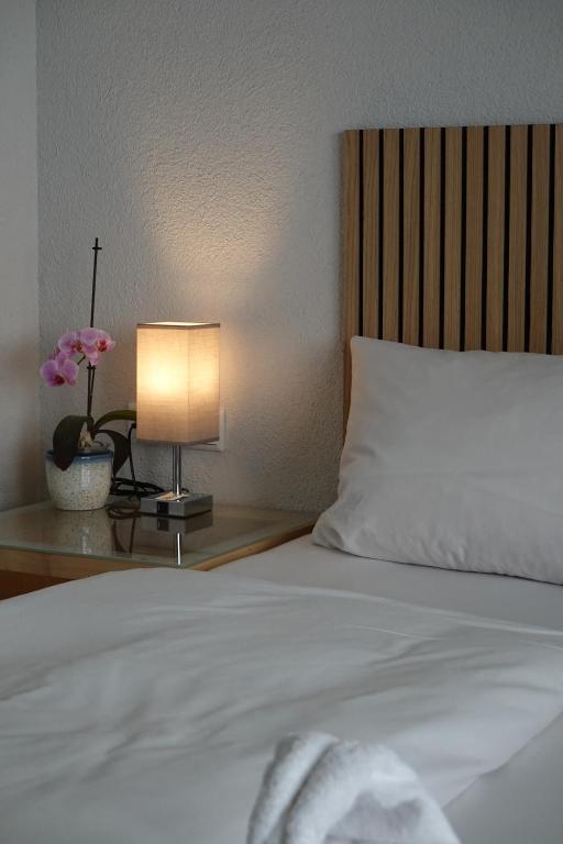 Postel nebo postele na pokoji v ubytování Hotel Birnbaum