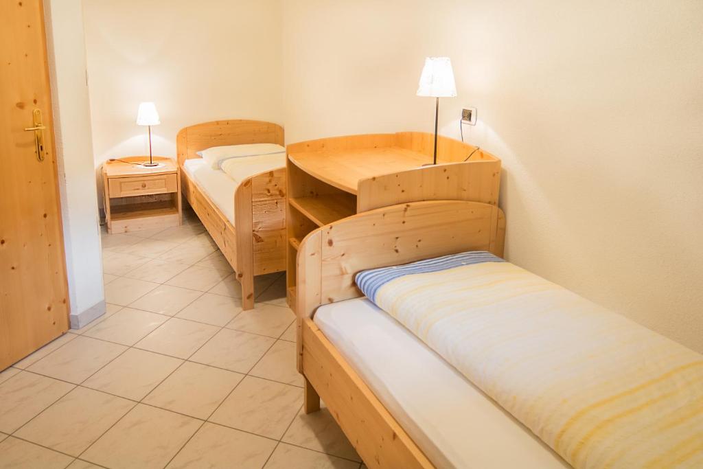 Postel nebo postele na pokoji v ubytování Bärntalerhof