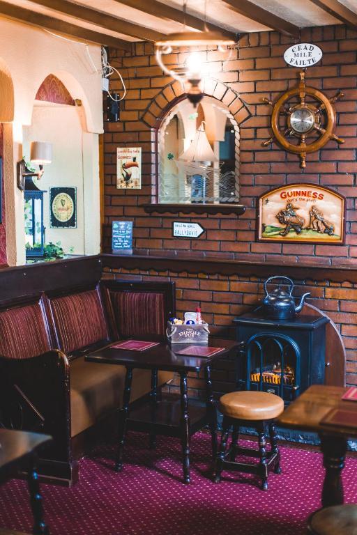 Posezení v ubytování The Dingle Pub Rooms