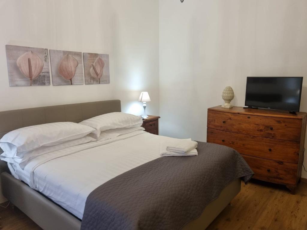 Postel nebo postele na pokoji v ubytování Alakarà Suite