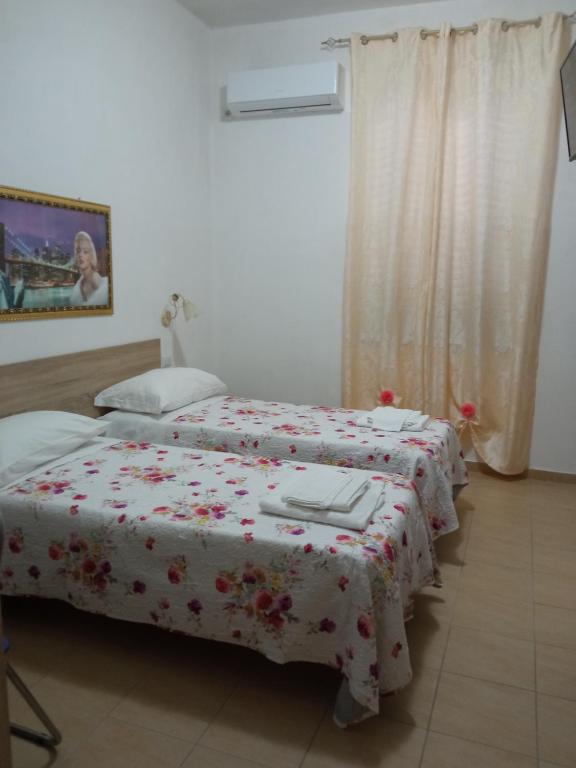Postel nebo postele na pokoji v ubytování B&B in family Gabriele