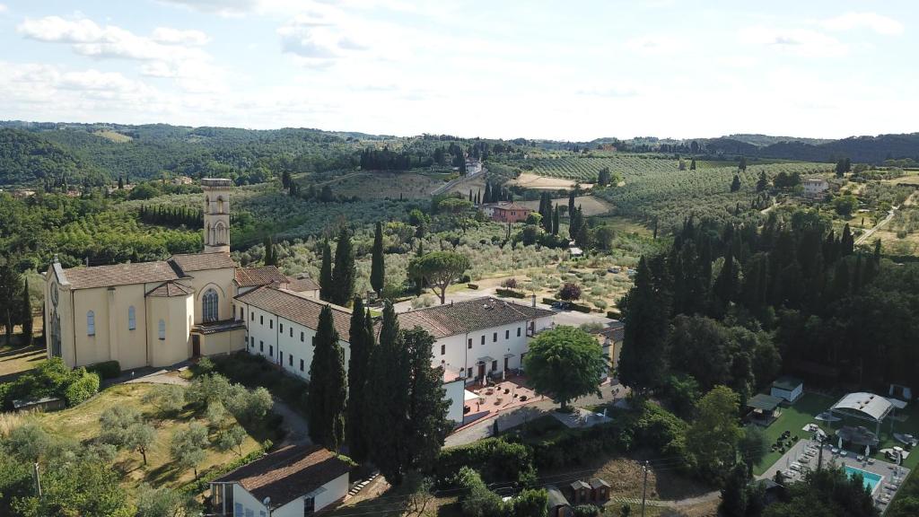 an aerial view of a building on a hill at Villa Castiglione in Impruneta
