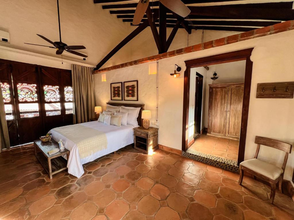 Postel nebo postele na pokoji v ubytování Casa Linaje Hotel Boutique - Cauca Viejo - Mayores de 10 años -