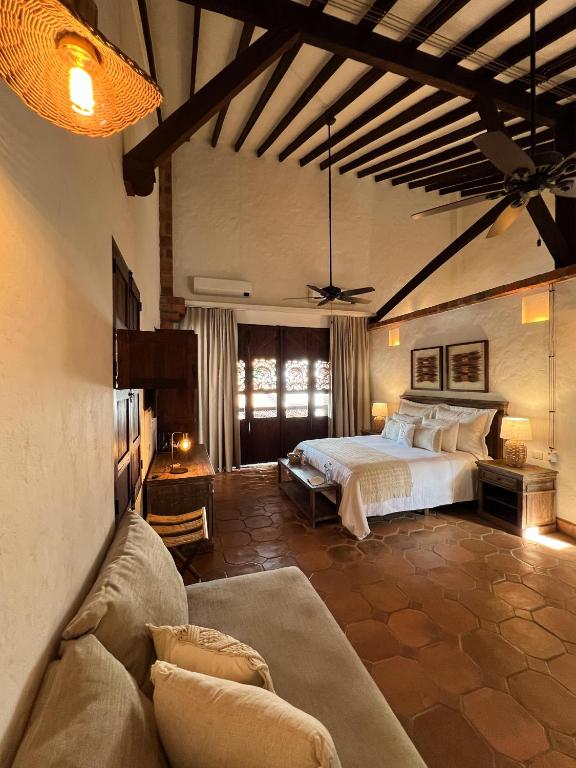 Postel nebo postele na pokoji v ubytování Casa Linaje Hotel Boutique - Cauca Viejo - Mayores de 10 años -