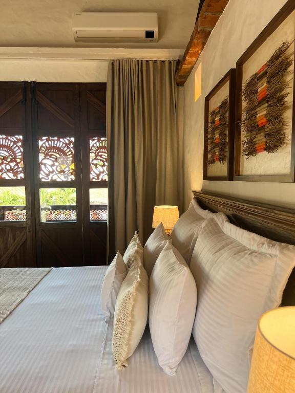 Postel nebo postele na pokoji v ubytování Casa Linaje Hotel Boutique - Cauca Viejo - Mayores de 10 años -