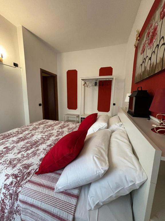 Postel nebo postele na pokoji v ubytování Bnbook Il Geco
