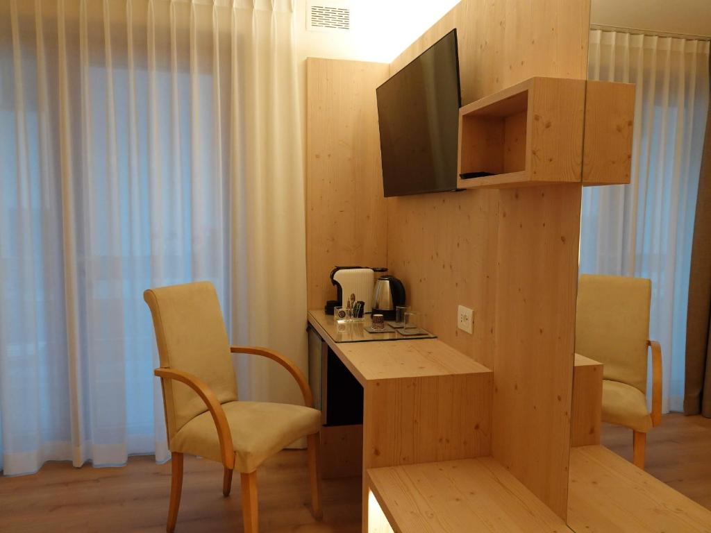 Kuchyň nebo kuchyňský kout v ubytování Alpine Rooms and Suites Livigno - Camana Noa -