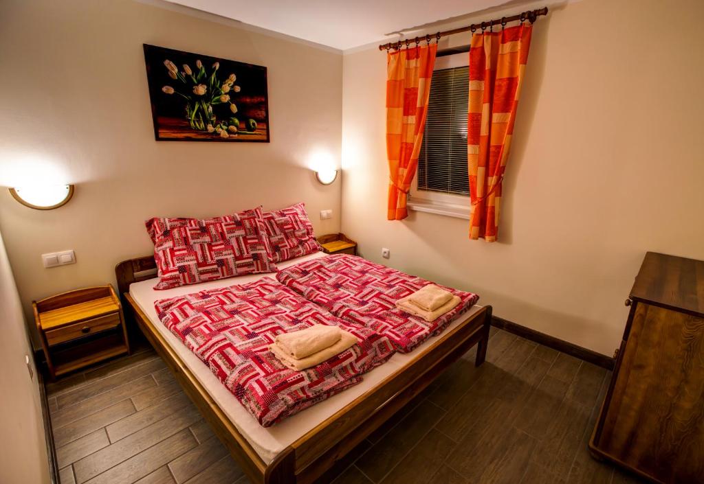 Postel nebo postele na pokoji v ubytování Apartmány Lenka