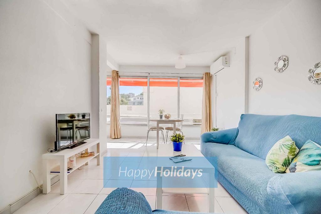 A seating area at HH Sur Apartment