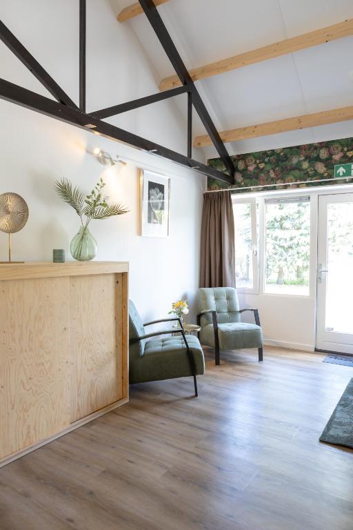 Posezení v ubytování B&B Hoeve de Veldmaat