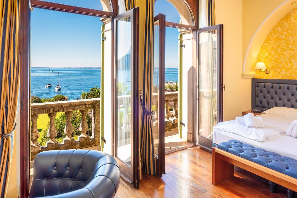 Postel nebo postele na pokoji v ubytování Hotel Du Parc